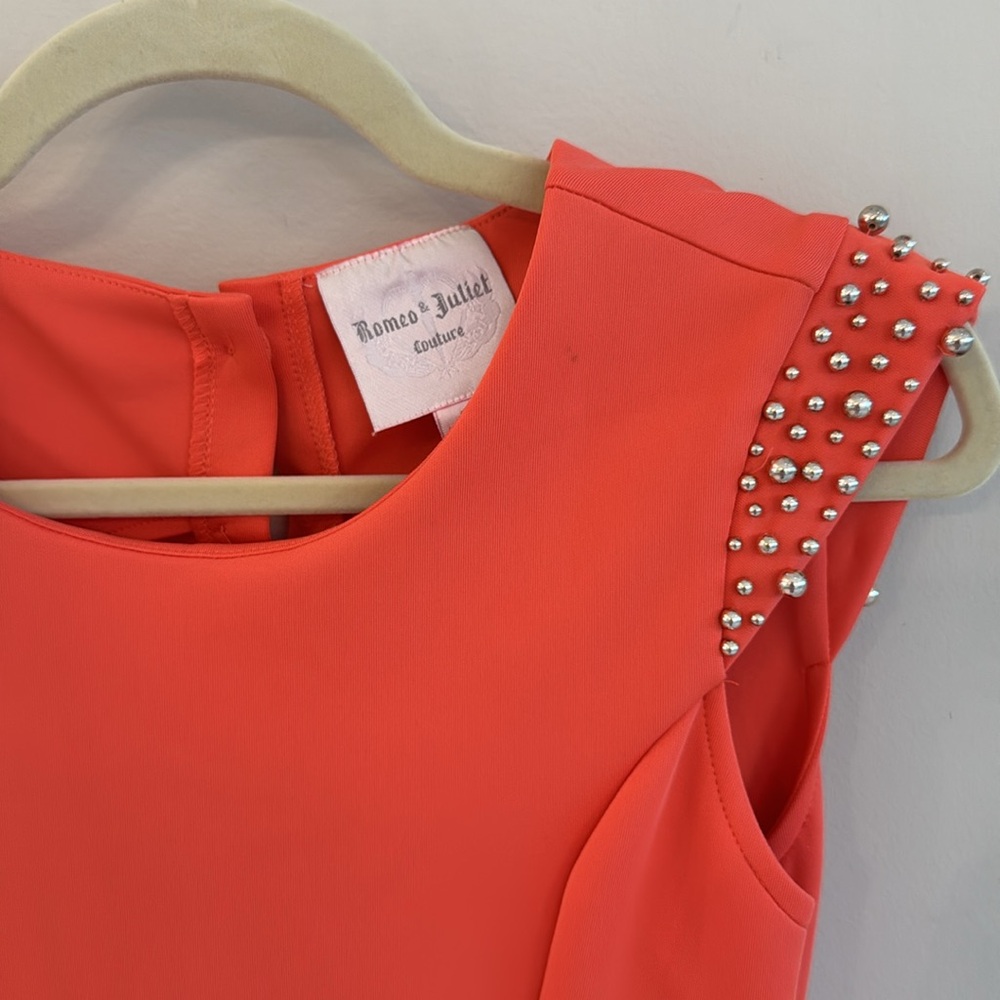 Bright orange mini dress with silver bead sleeve cap detail